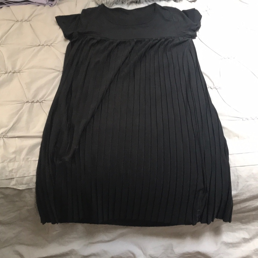No tags but I am size medium. Beautiful dress.